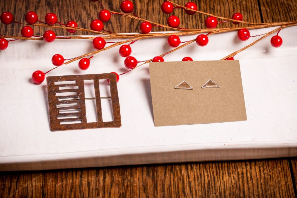 Window Pin and triangular earrings. Taliesin is here to help with your holiday shopping.