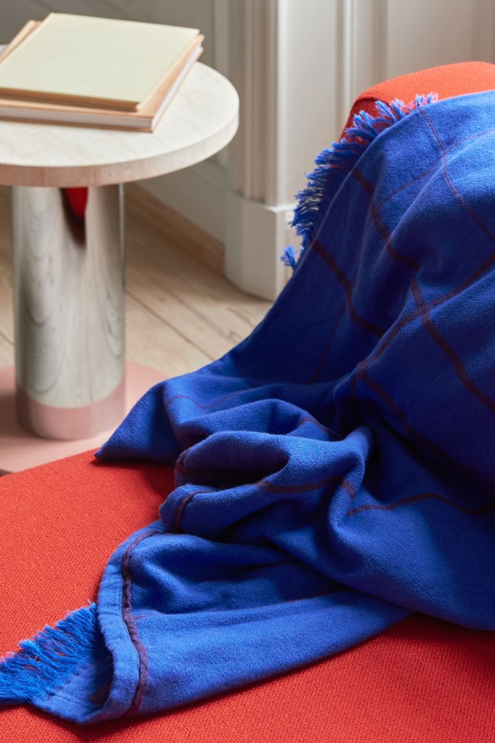 Strong accents of red and blue seen here with &Tradition, one of the Scandinavian interior design trends for 2023.